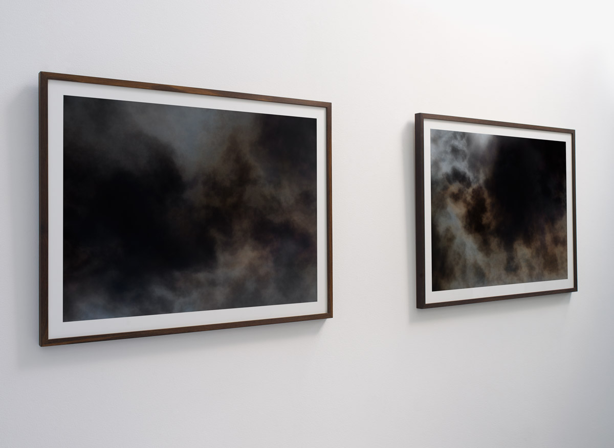 Installation view of two fine art photograph from the “Wildfire" exhibition in Copenhagen by photographer Kenneth Rimm. Viewed from right side.