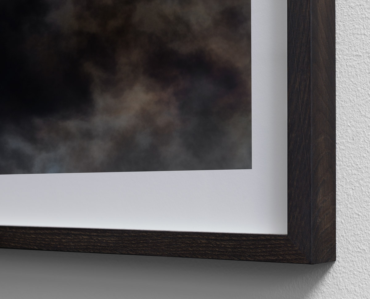 Detail of "Wildfire” exhibition print framed in solid smoked oak.