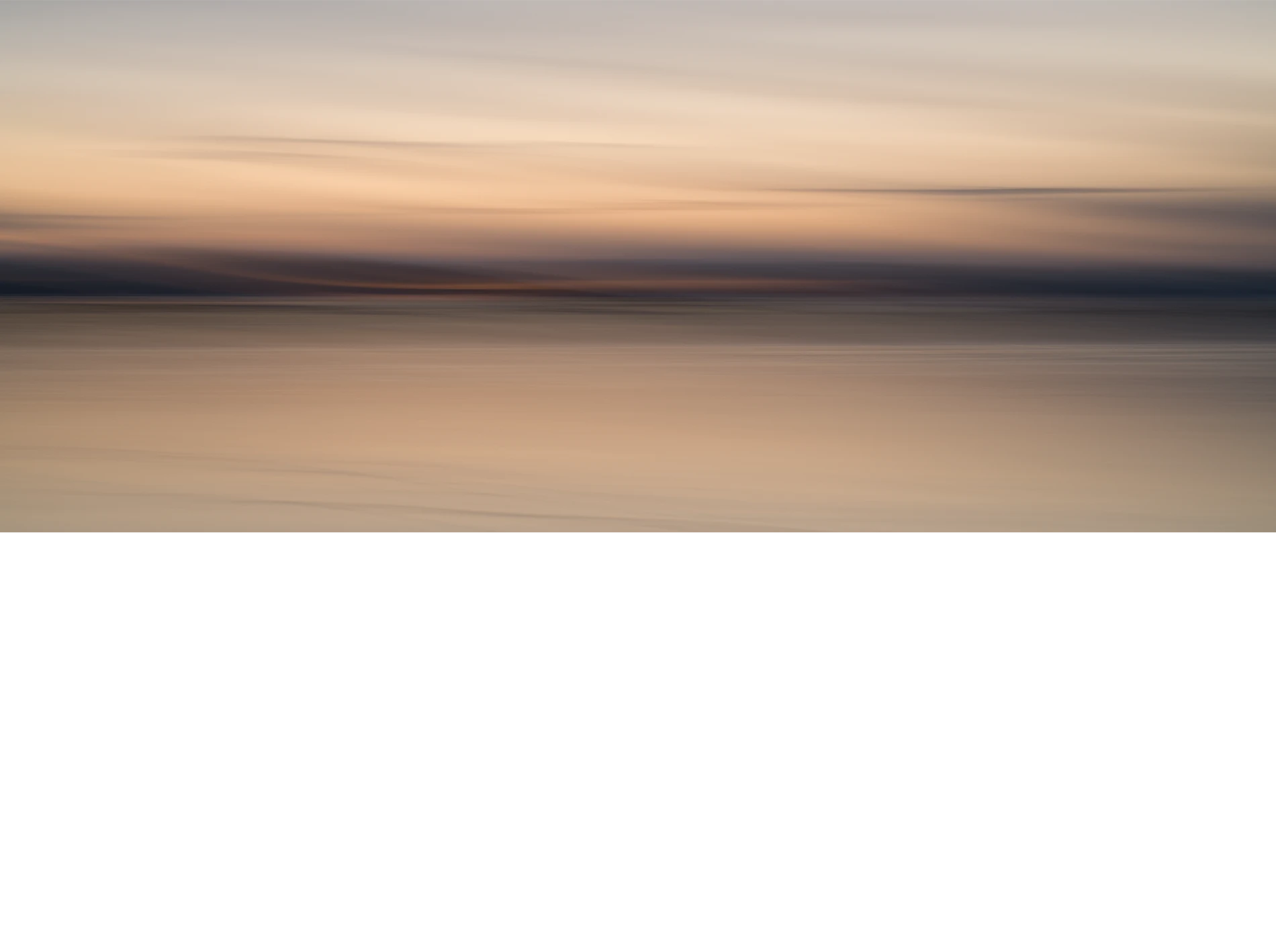 Abstract-seascape-panorama-color-art-copyright-photographer-Kenneth-Rimm Abstract seascape panoramic photograph in warm muted colors from the twilight sky reflecting in the ice covered water. From the Liquid Light seascapes series by fine art photographer Kenneth Rimm.