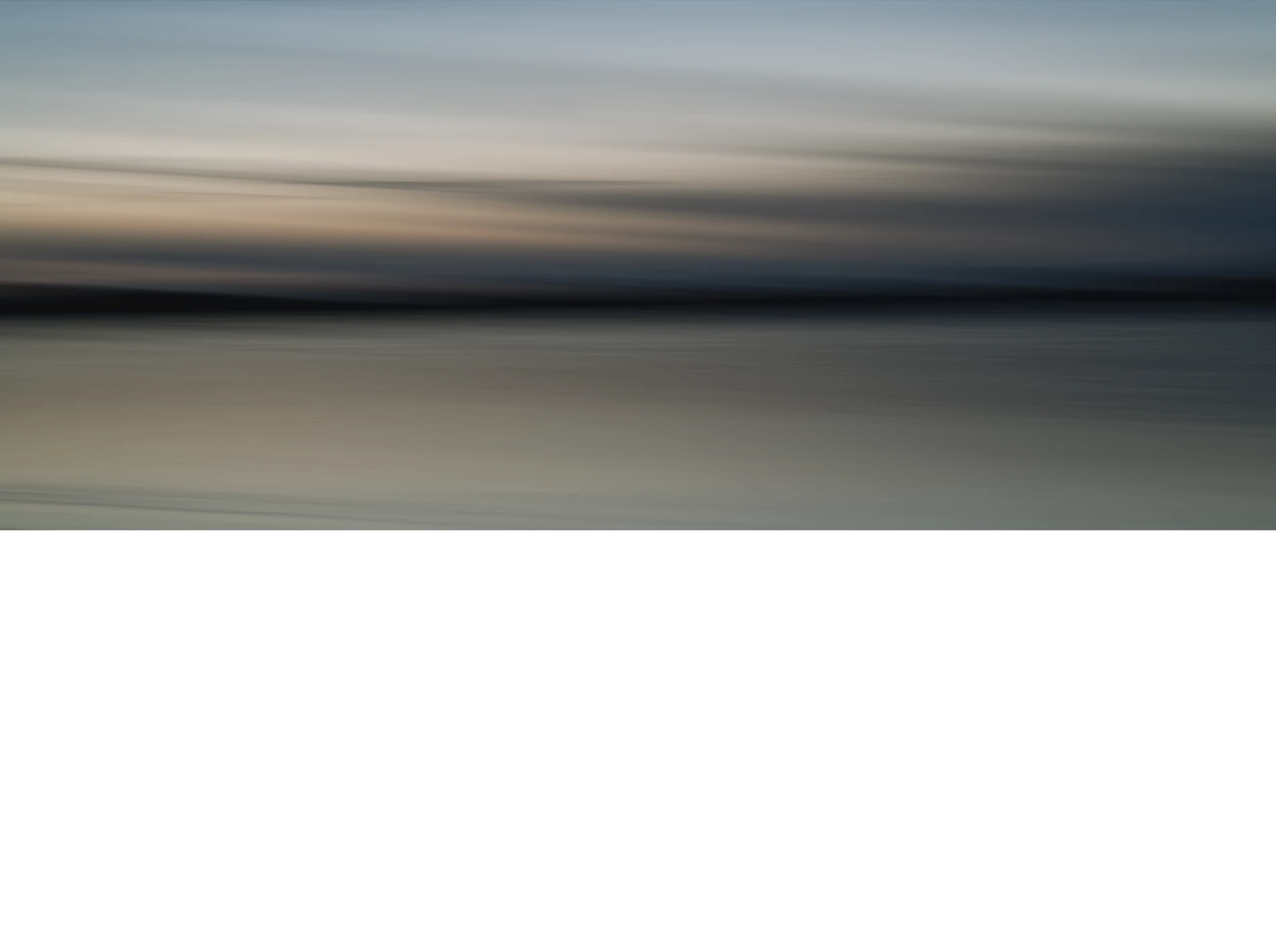 Abstract-seascape-panorama-color-art-copyright-photographer-Kenneth-Rimm-3 Contemporary abstract seascape panoramic photograph in warm muted colors and muted dark ocean blue / steel blue colors from the twilight sky reflecting in the ice covered water, from the Liquid Light seascapes series by fine art photographer Kenneth Rimm.